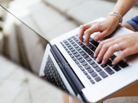 focused_173718416-stock-photo-hands-woman-typing-keyboard-laptop
